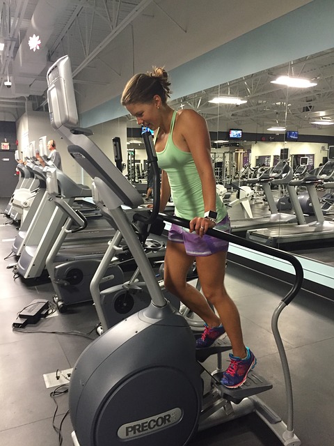 woman doing elliptical training